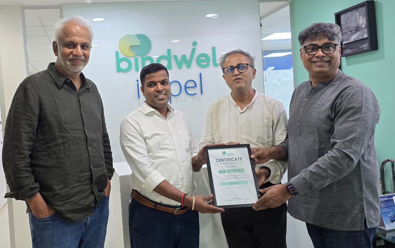 Bindwel presenting the authorised channel partner certificate to Mani Enterprises